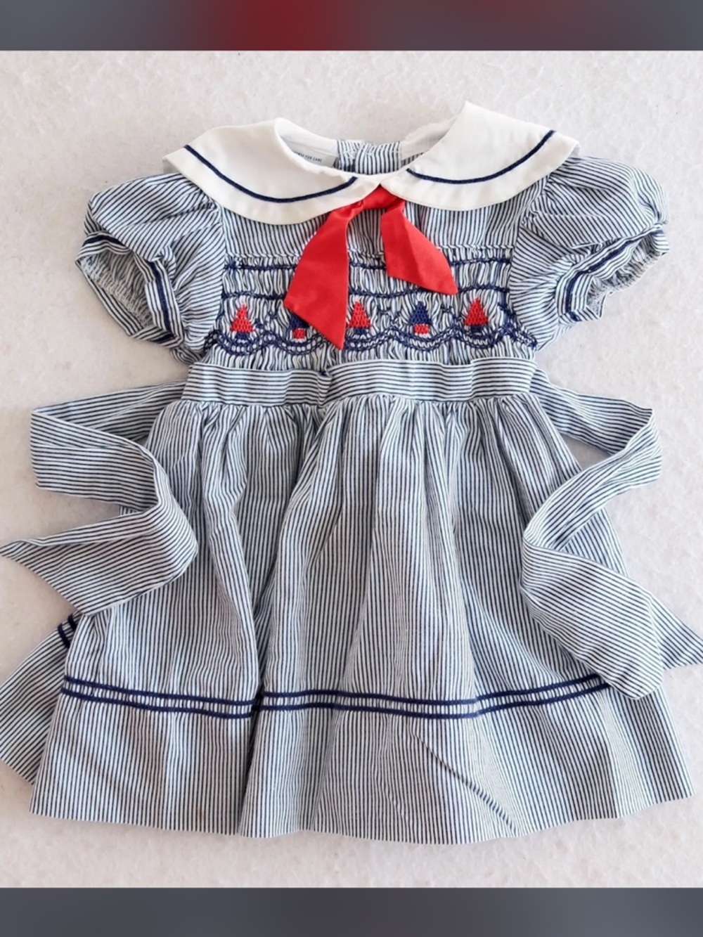 Vintage Polly Flinders Hand
Smocked Nautical Sailboat
Dress, size 2T